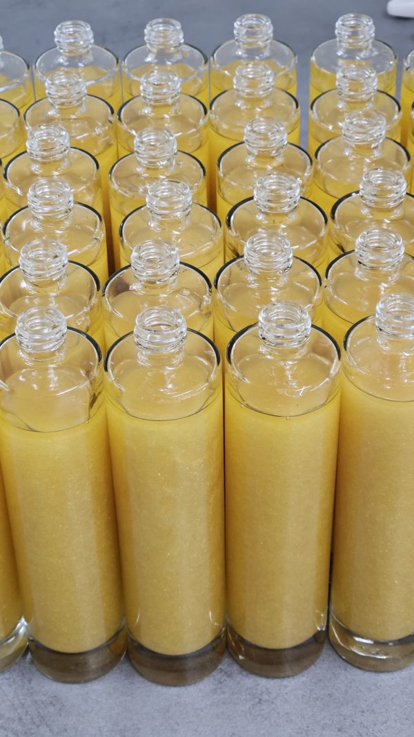 Huile corporelle artisanale Baiser indien irisée or - soin scintillant pour le corps fabriqué en Suisse